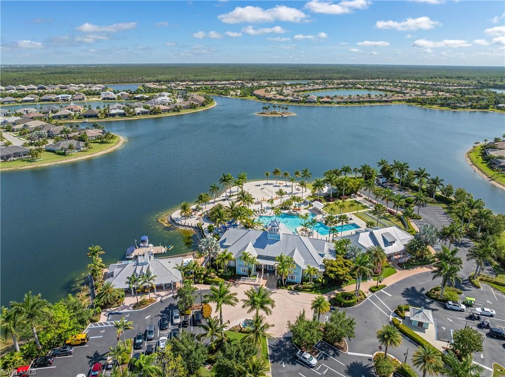 Aerial perspective of suburban area with a large body of water