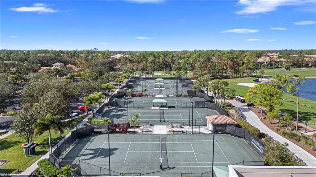 Drone / aerial view of a large body of water and a local golf course