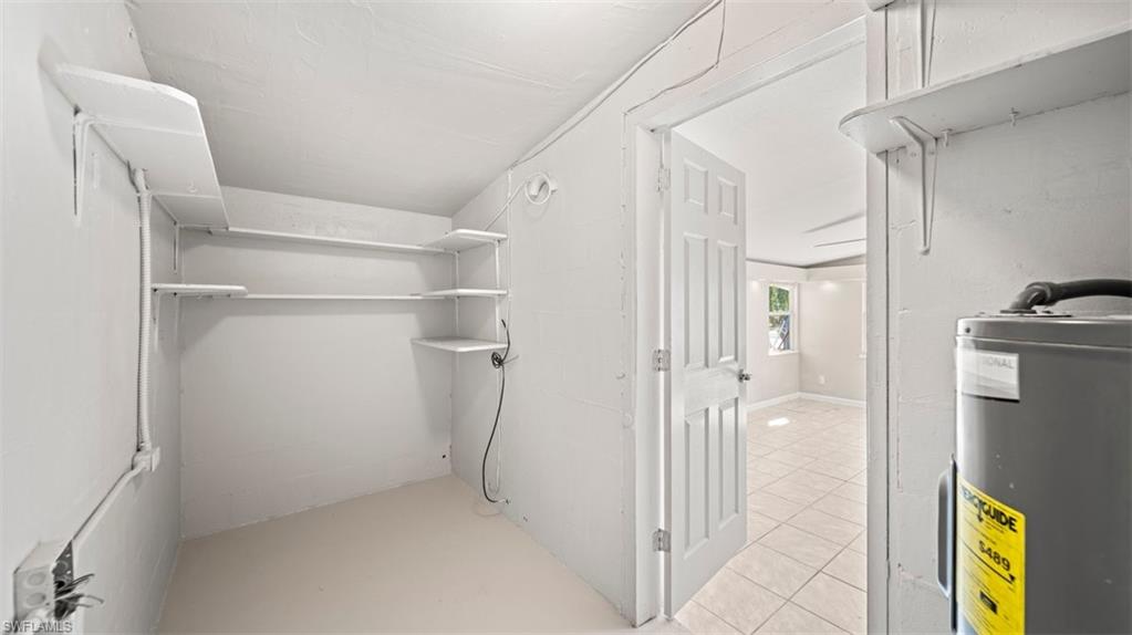 Spacious closet featuring electric water heater