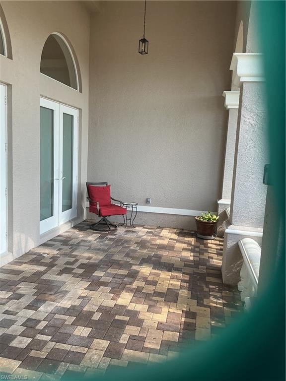 View of patio featuring french doors