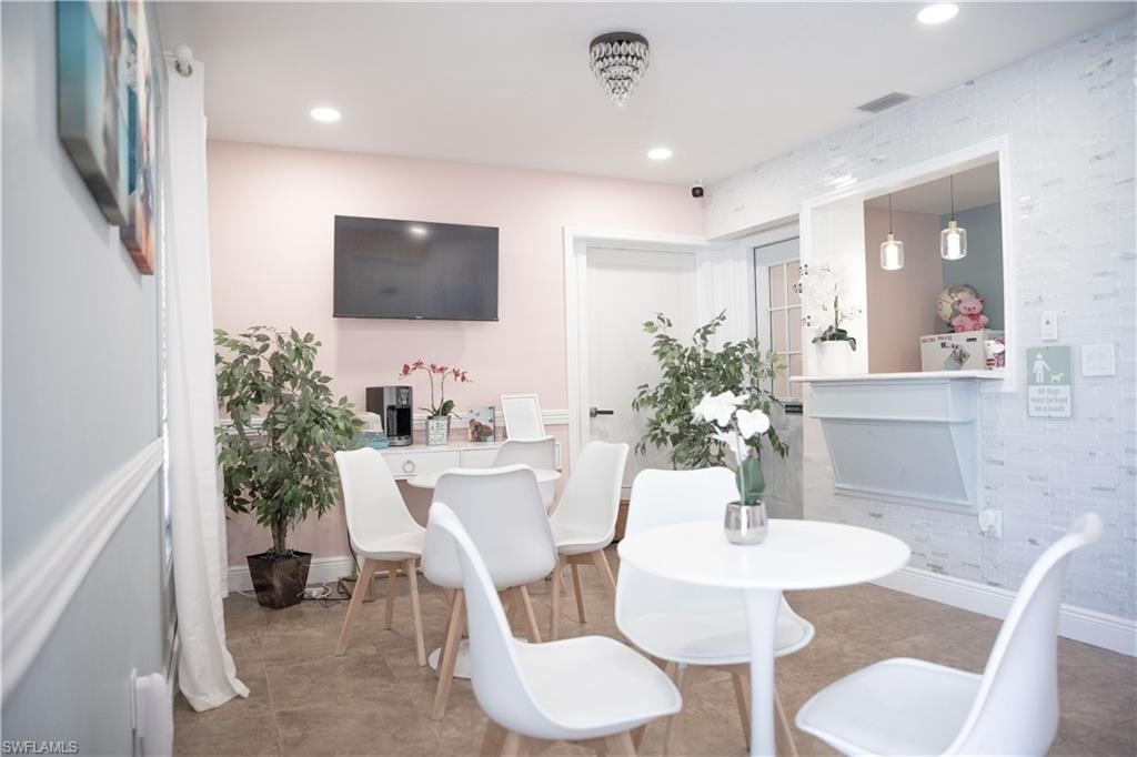 Dining area featuring recessed lighting