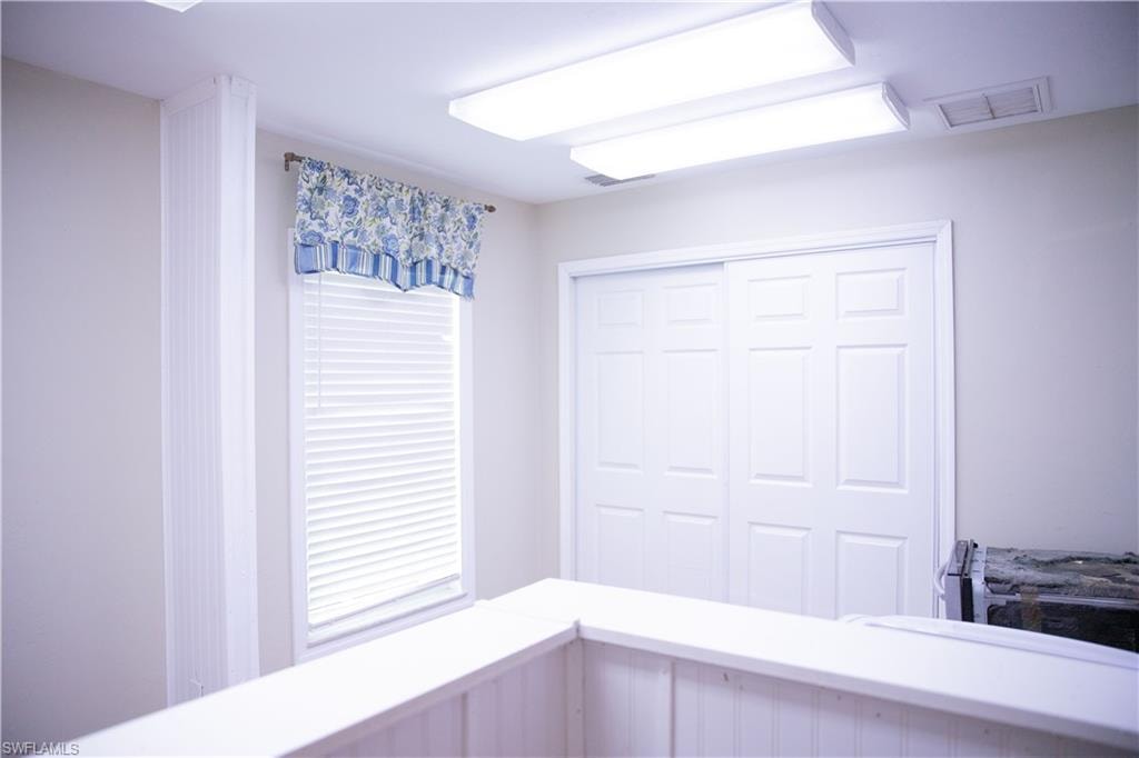 Unfurnished bedroom with a closet