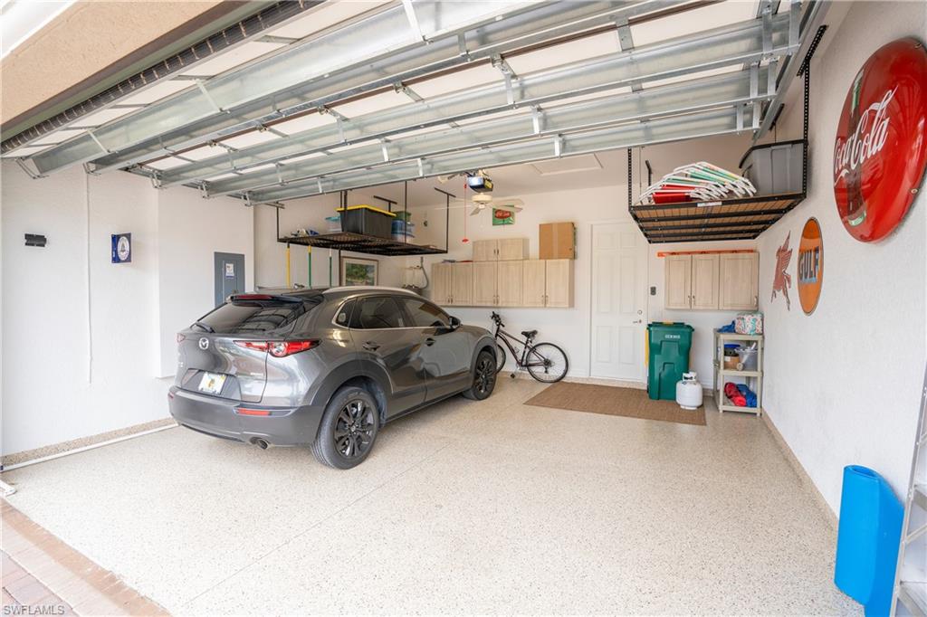 Garage featuring electric panel