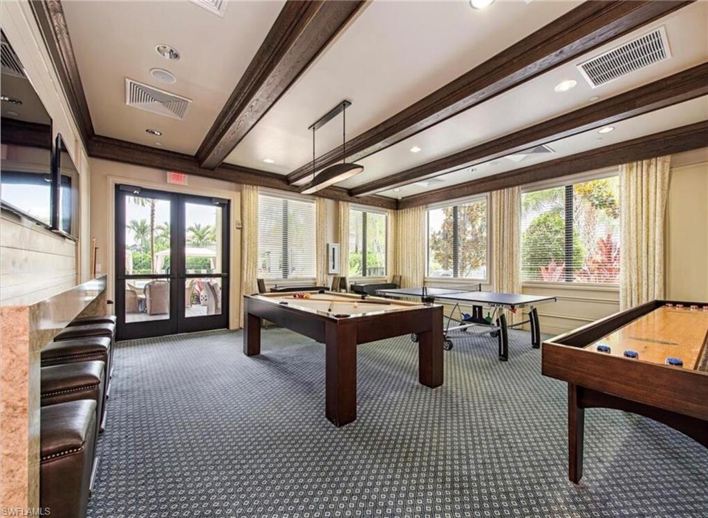 Playroom featuring french doors, beamed ceiling, pool table, plenty of natural light, and recessed lighting