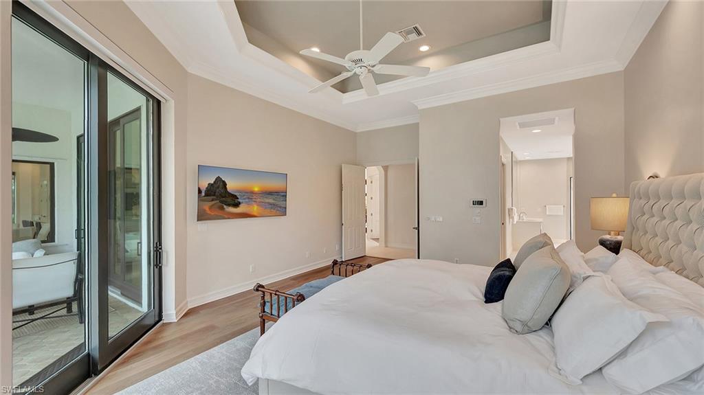 Primary Bedroom Suite with electric window blinds