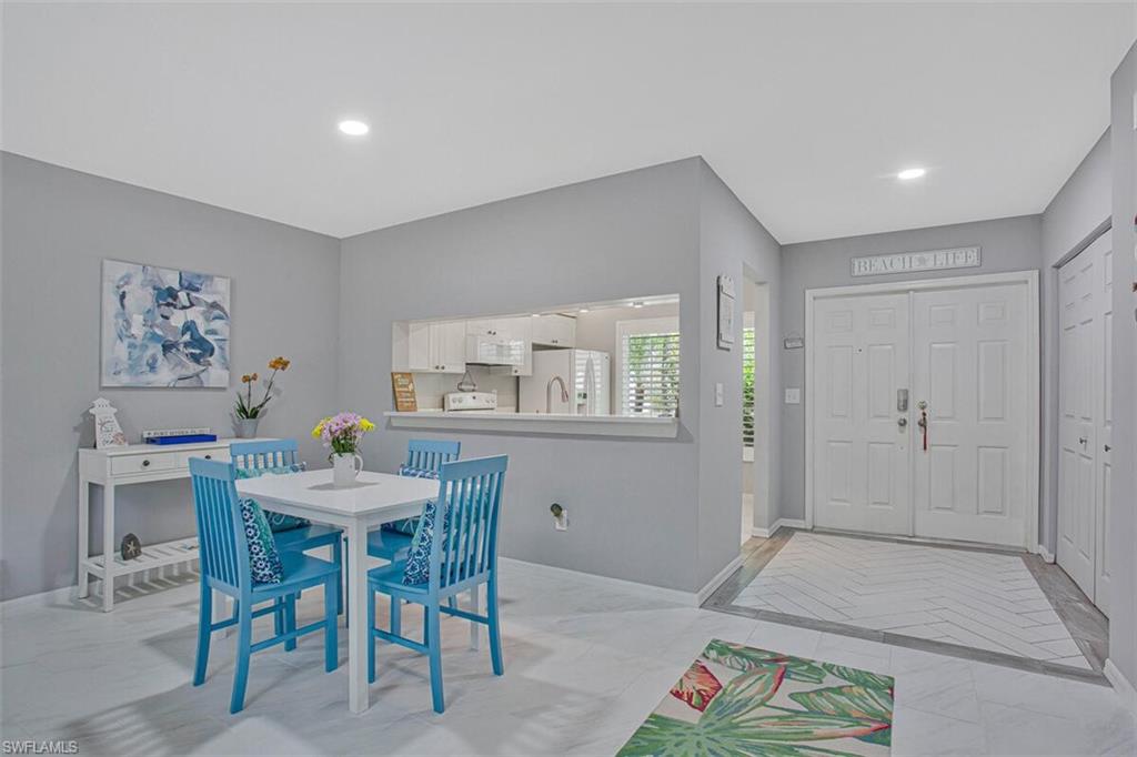 Dining room featuring baseboards and recessed lighting