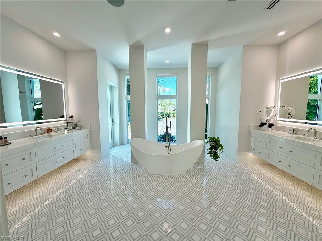 Primary bathroom with door to outside shower