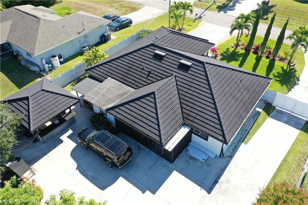 Aerial back side view of the property