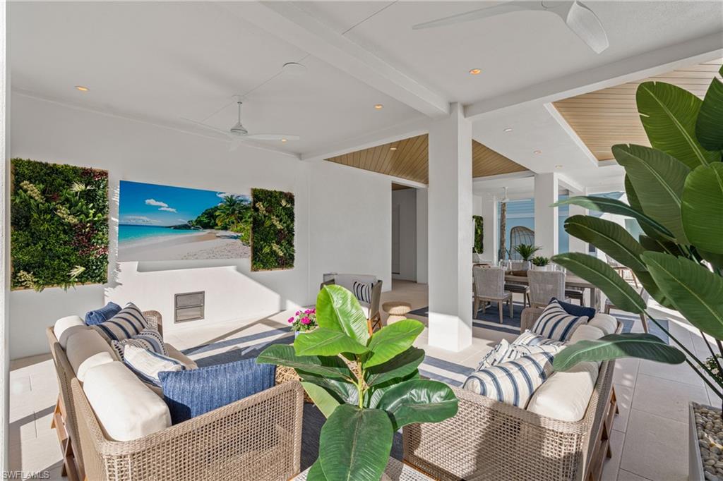 View of patio / terrace featuring a ceiling fan and outdoor lounge area