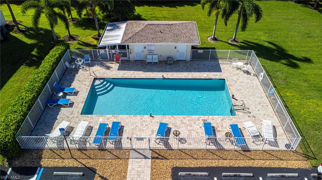Community pool featuring a patio area