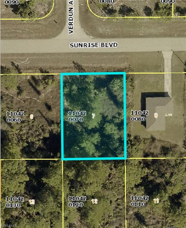 Aerial view of property's location featuring property parcel outlined