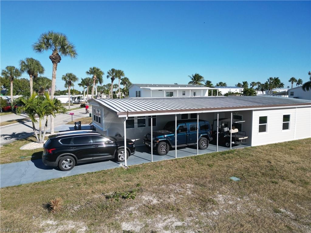 Covered parking including golf cart