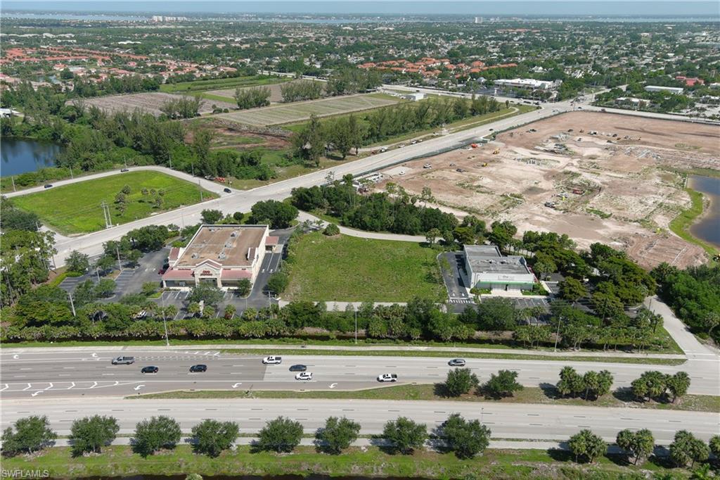 Aerial perspective showcasing commercial properties with surrounding landscaping