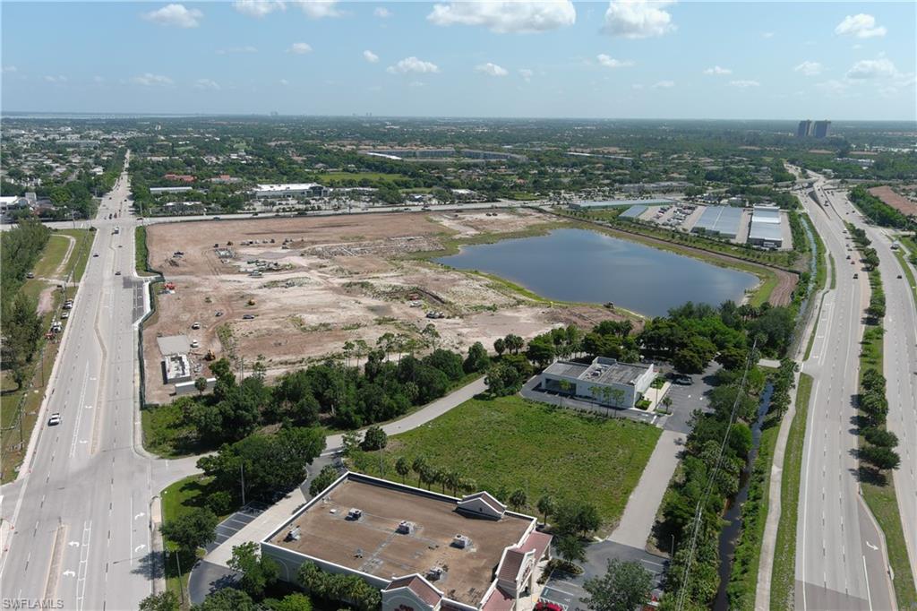 Expansive land parcel featuring a large water body