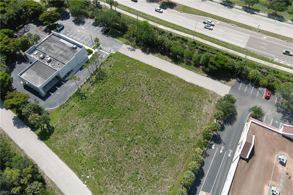Expansive undeveloped parcel featuring a grass and brush surface