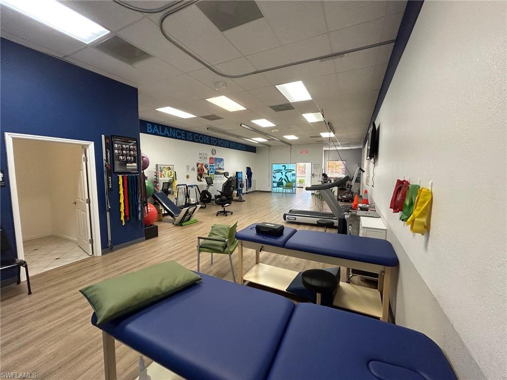 Gym featuring a drop ceiling