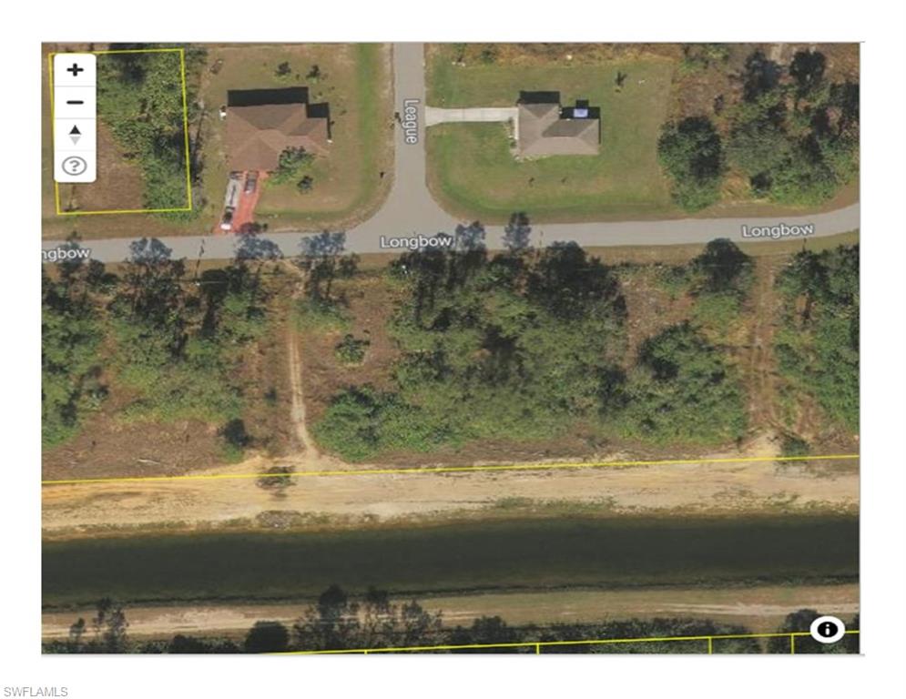 Aerial map of property and surrounding area featuring property parcel outlined