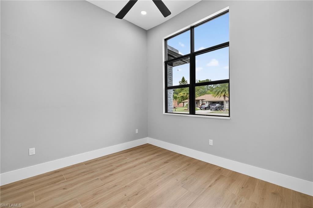 Unfurnished room with light wood-style floors, recessed lighting, and ceiling fan