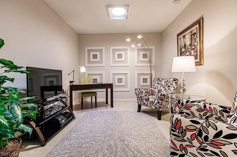 Living room with carpet floors