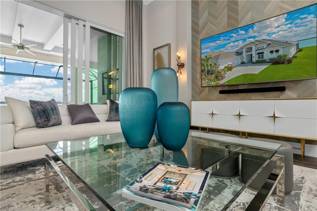 Living room featuring a ceiling fan