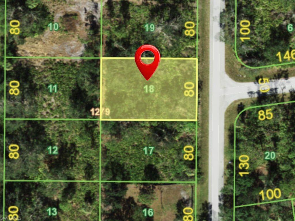 Aerial map of property and surrounding area featuring property parcel outlined