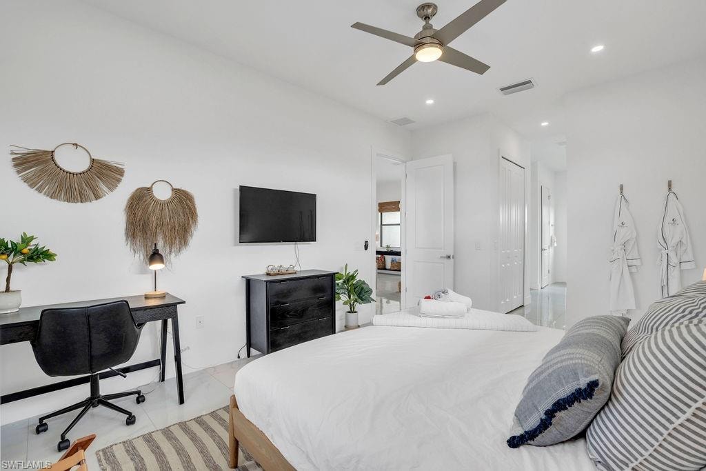 Bedroom featuring a desk, ceiling fan, recessed lighting, and a closet