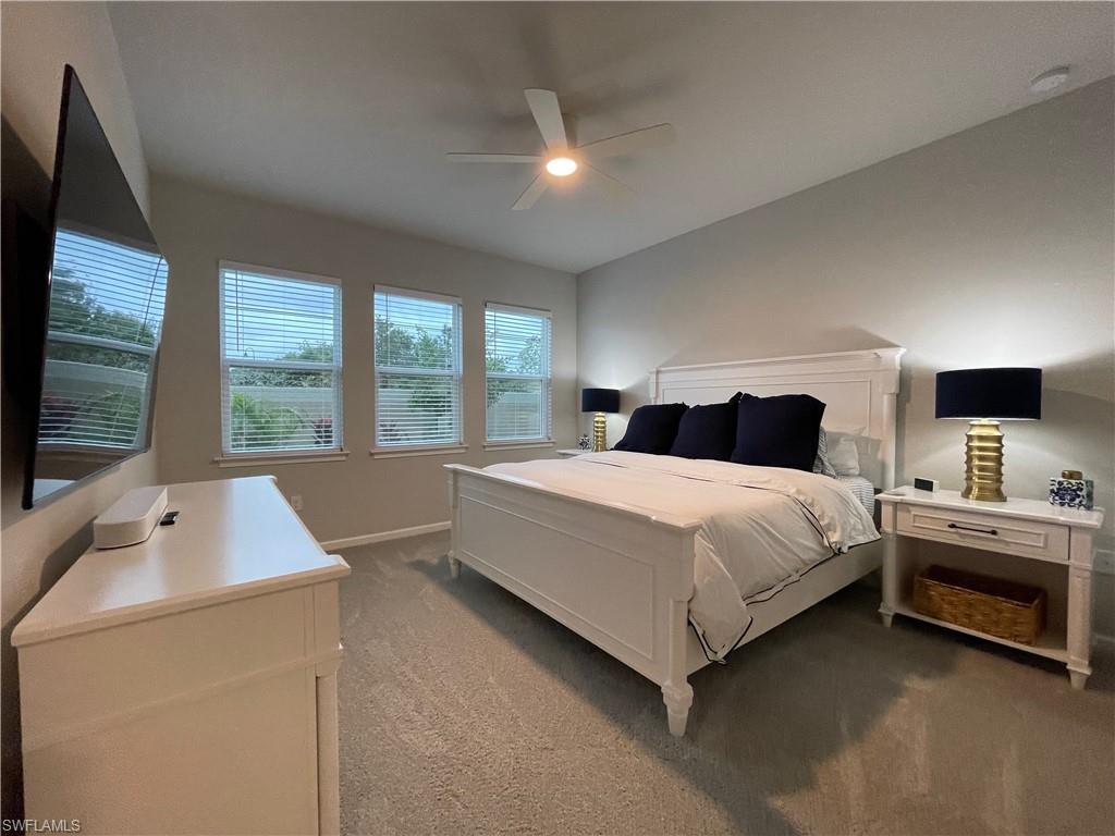 Bedroom featuring carpet floors and a ceiling fan