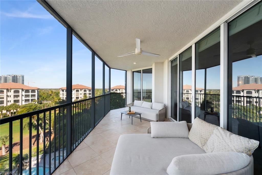 Balcony with ceiling fan and an outdoor hangout area
