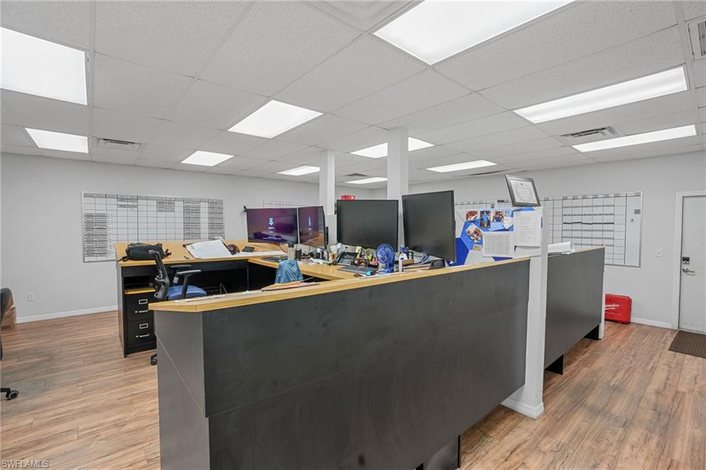 Office featuring a paneled ceiling
