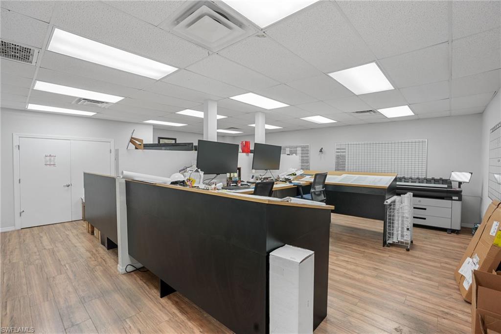 Office area featuring a drop ceiling