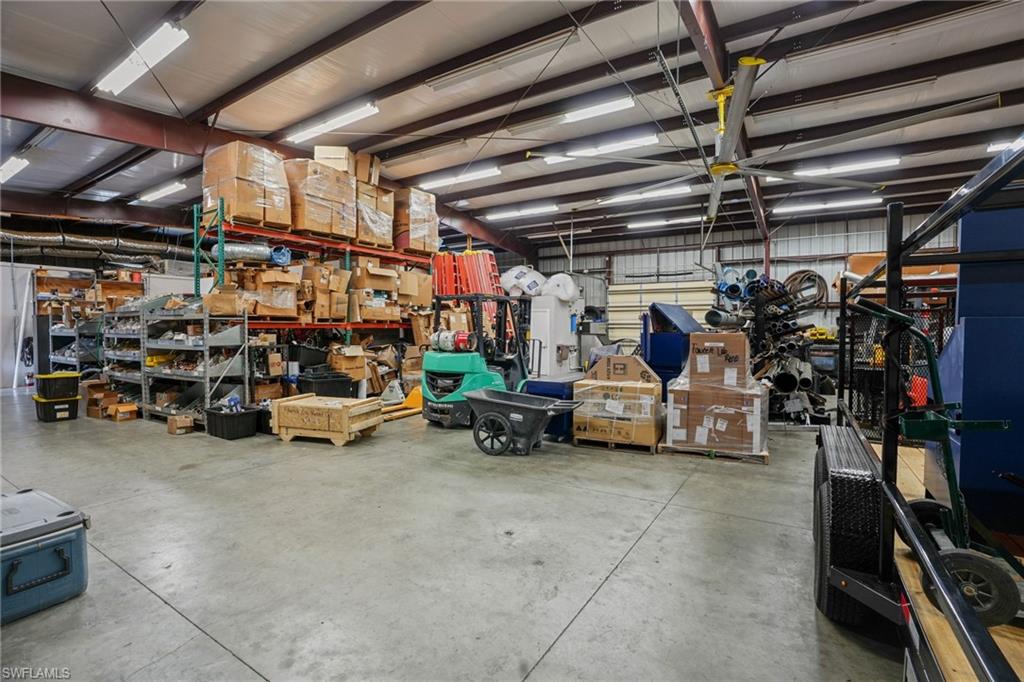 Garage featuring a workshop area