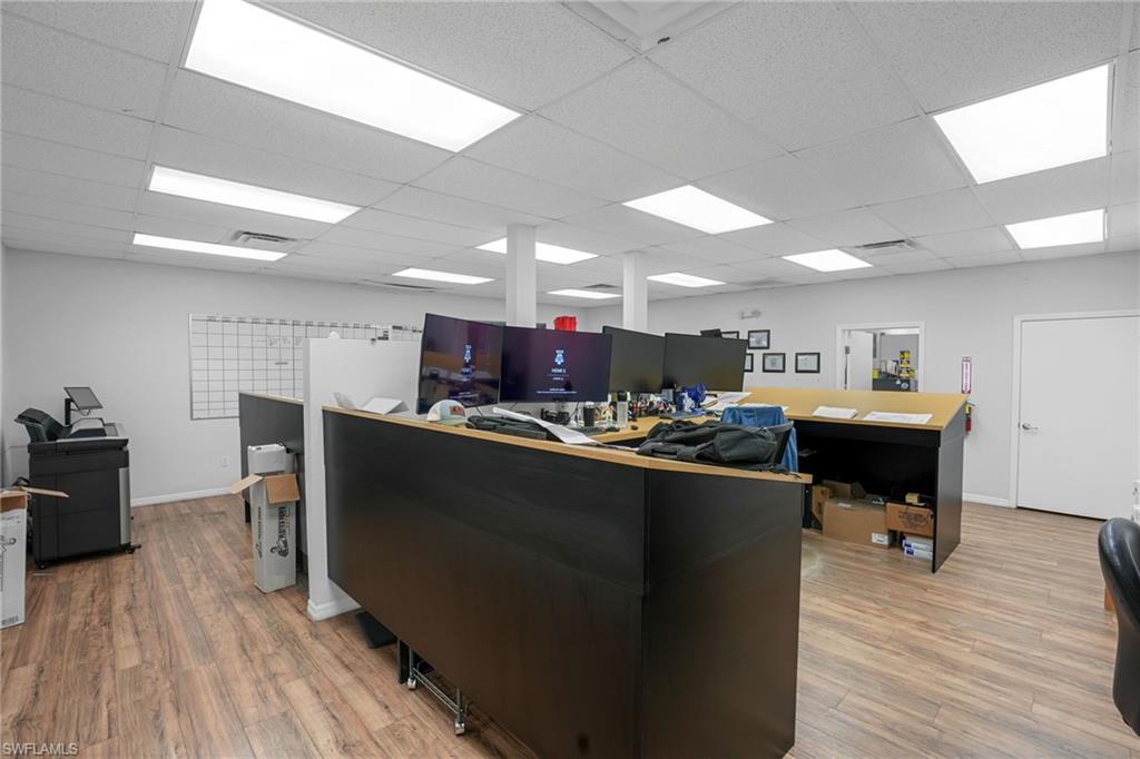 Office space featuring a drop ceiling