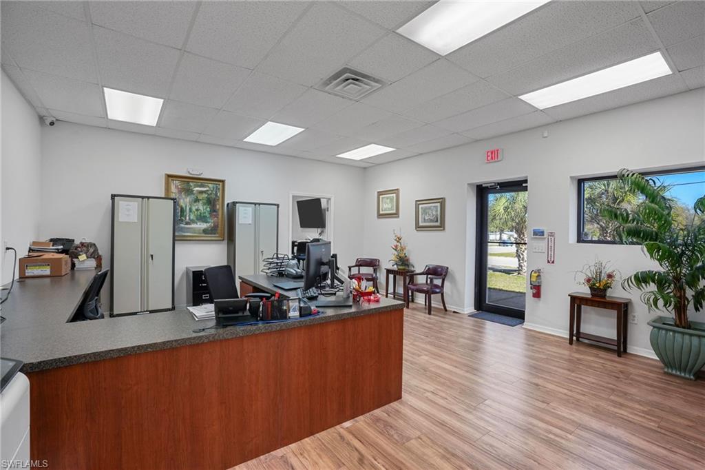 Welcome area featuring a drop ceiling