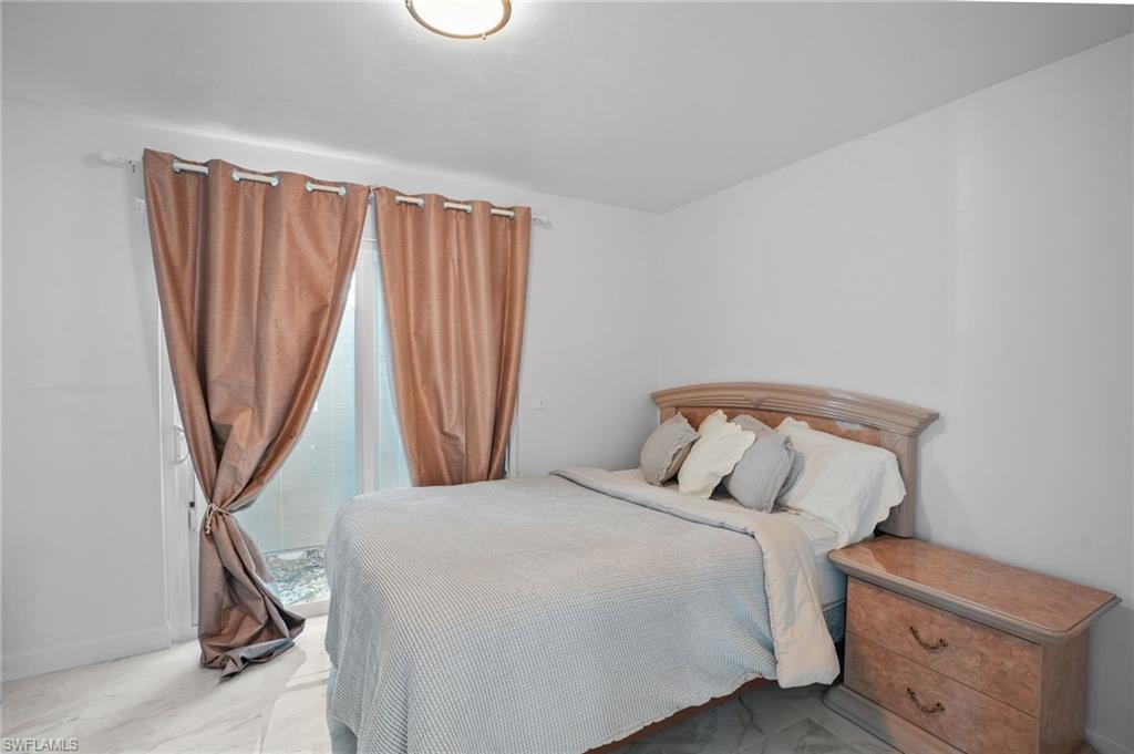 Bedroom with baseboards