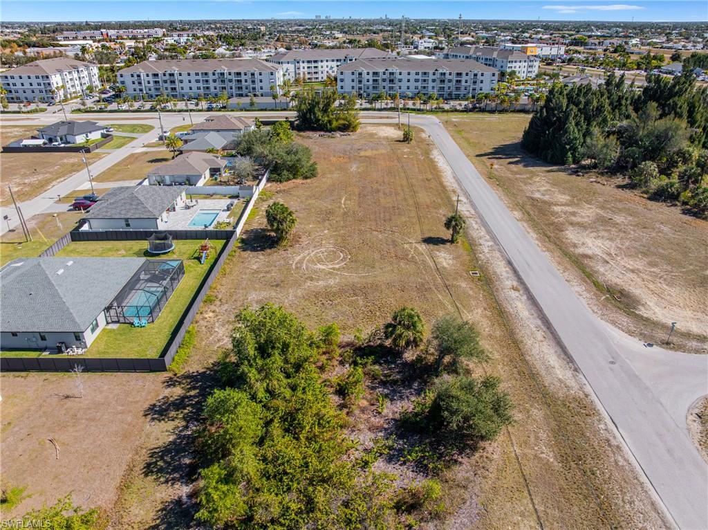 Drone / aerial view of apartment complex / building