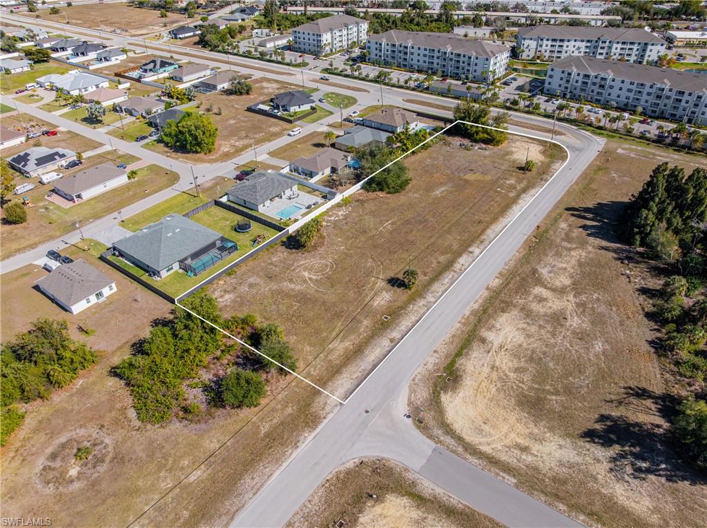 Aerial view of property's location featuring property parcel outlined