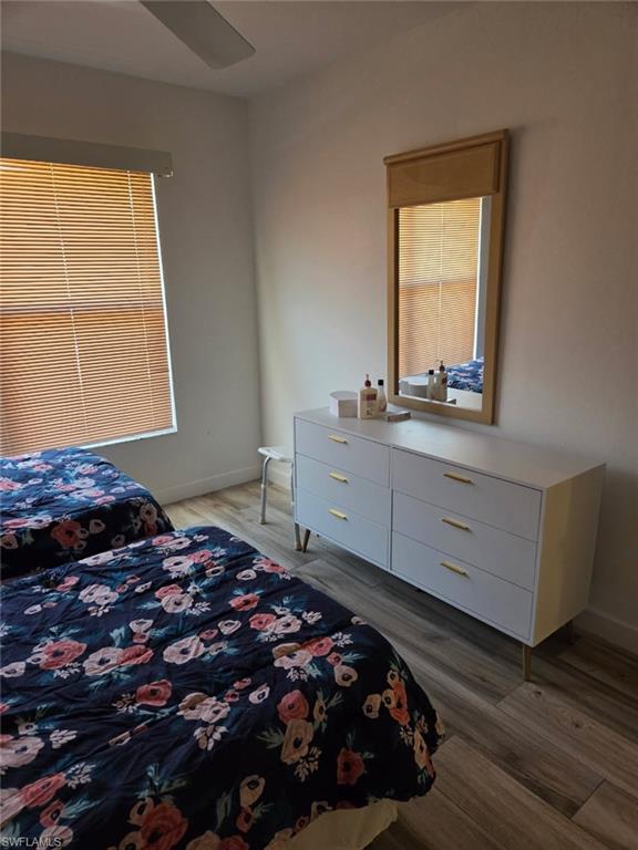 Bedroom with light wood finished floors