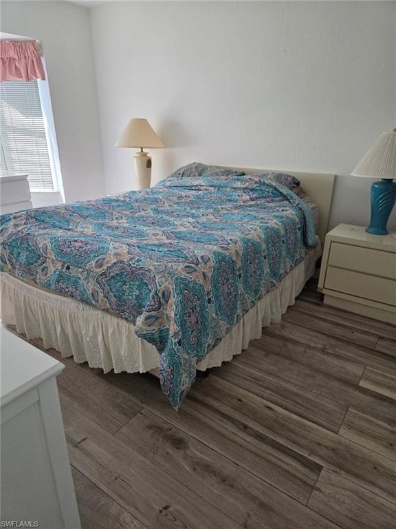 Bedroom featuring wood finished floors