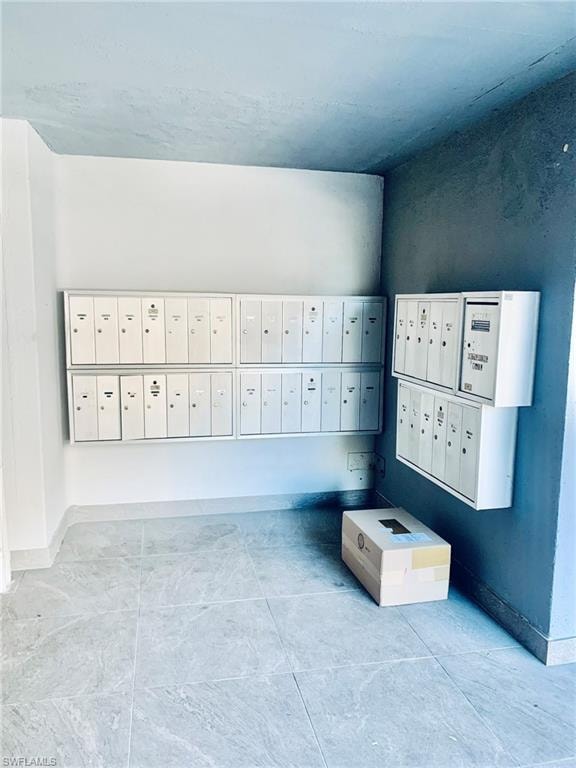 View of home's community featuring mail area