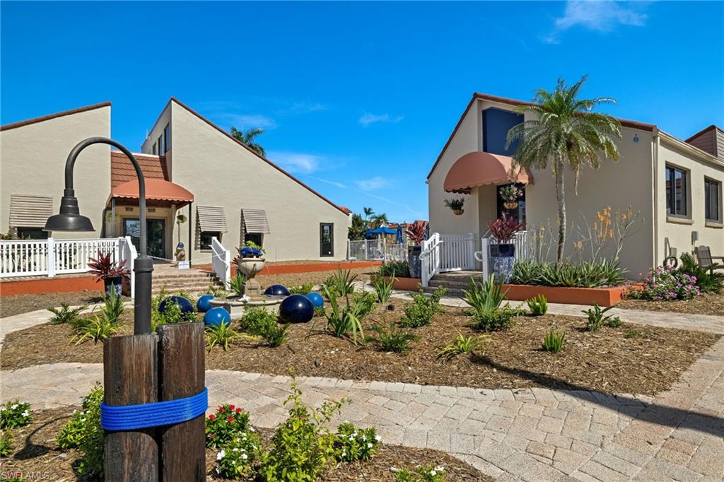 View of front facade featuring stucco siding