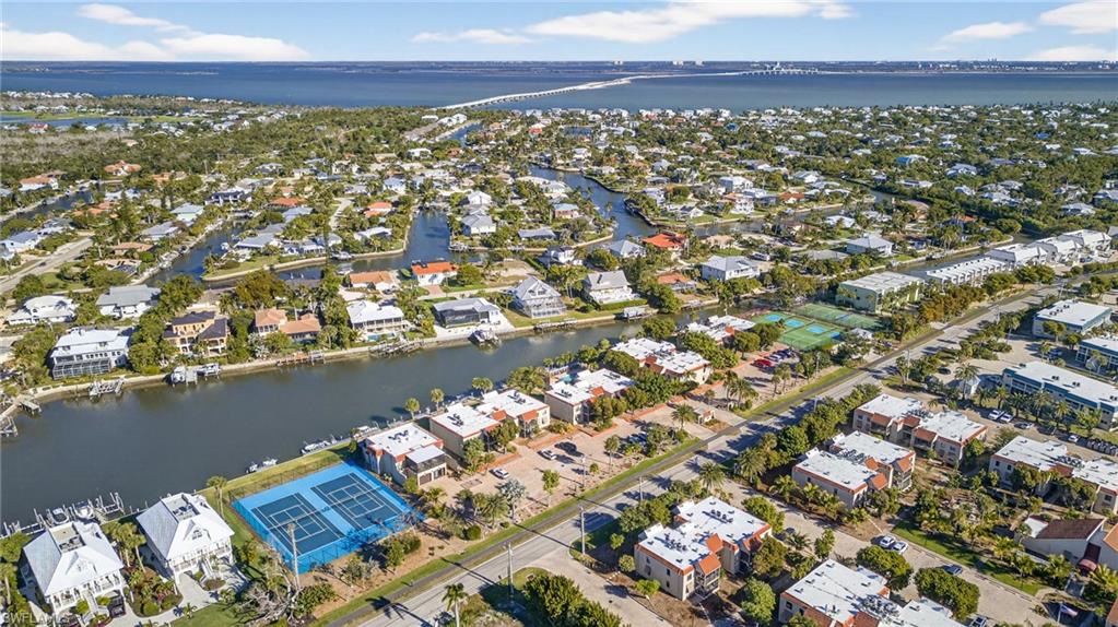 View of property location featuring nearby suburban area and a large body of water