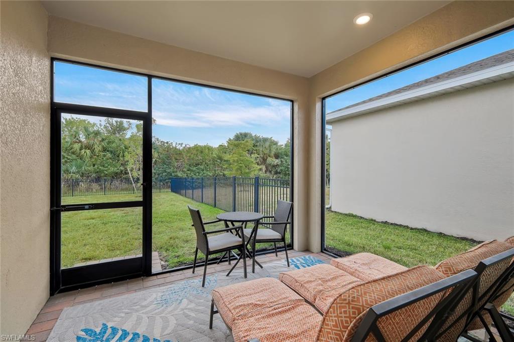 Sunroom with outdoor dining space