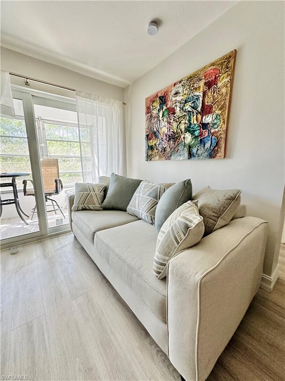 Living area with wood finished floors