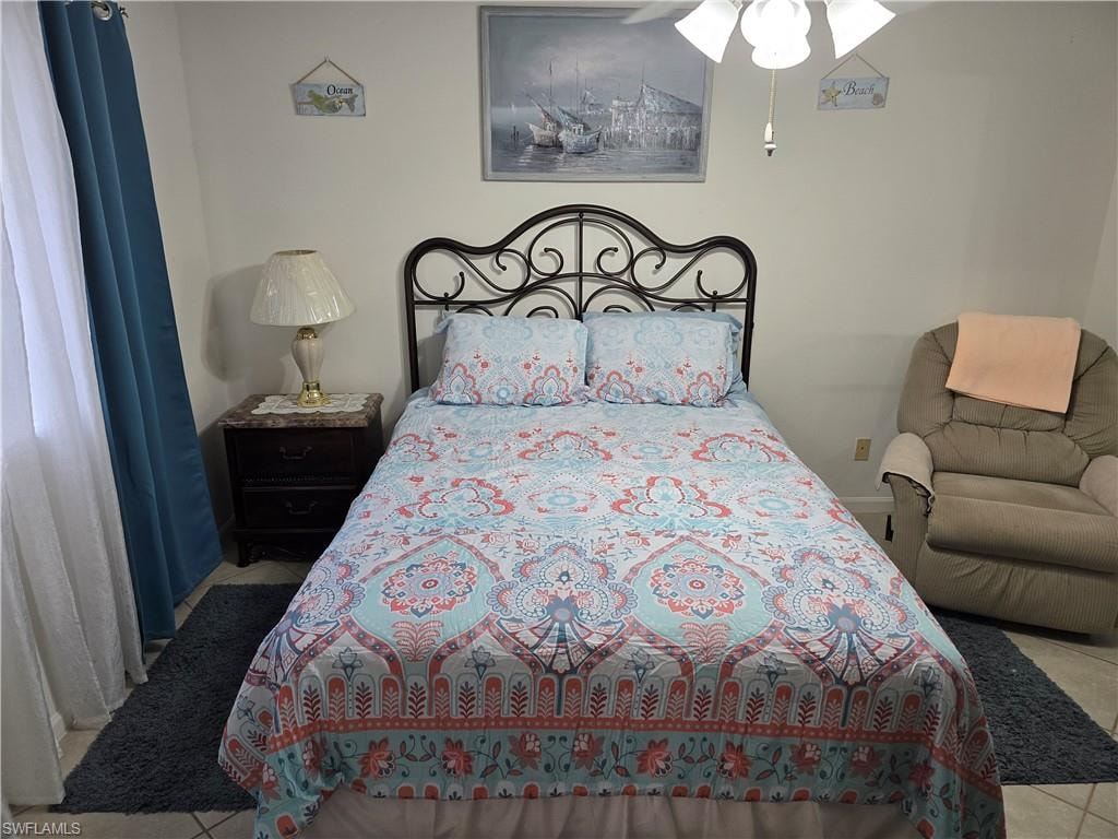 Bedroom featuring tile patterned flooring
