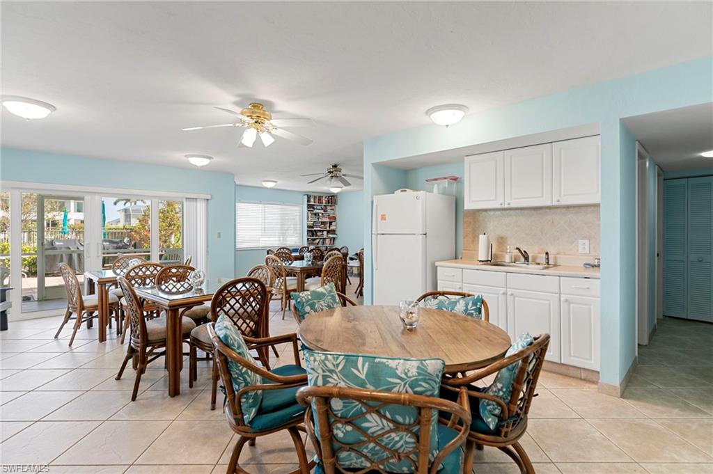 Social room and kitchenette close to pool and BBQ