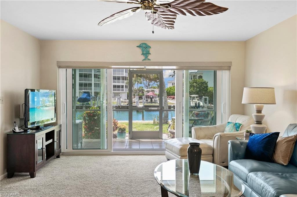 Impact-resistant sliders lead out to a waterfront view