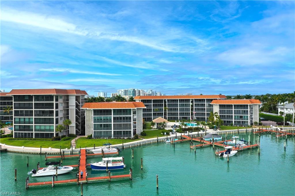 Water view featuring a dock