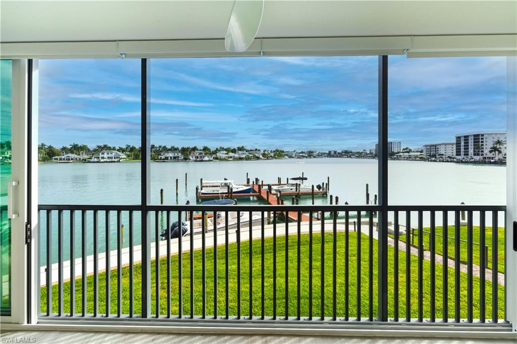 Water view featuring a boat dock