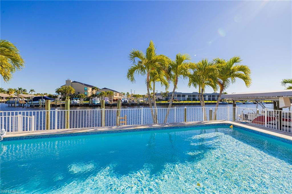View of swimming pool with a residential view