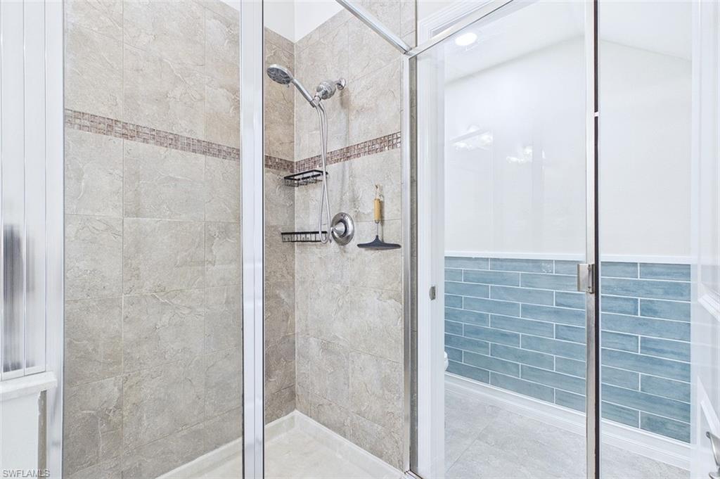 Full bath featuring a stall shower